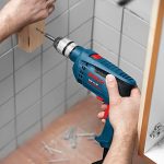 Máy khoan động lực Bosch GSB 13 RE SET (100 món phụ kiện)